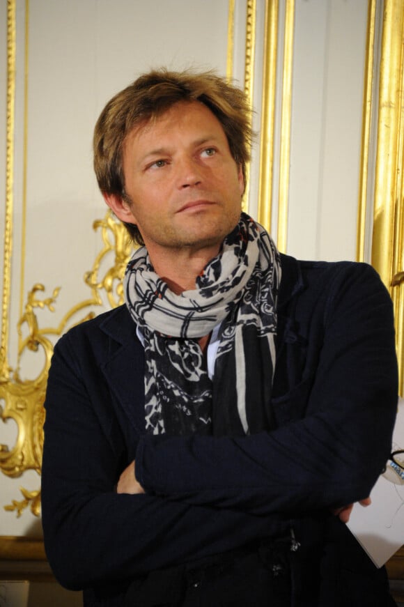 Laurent Delahousse - Conference de presse de l'operation "La Flamme Marie Claire" a l'hotel le Marois a Paris le 16 mai 2013.