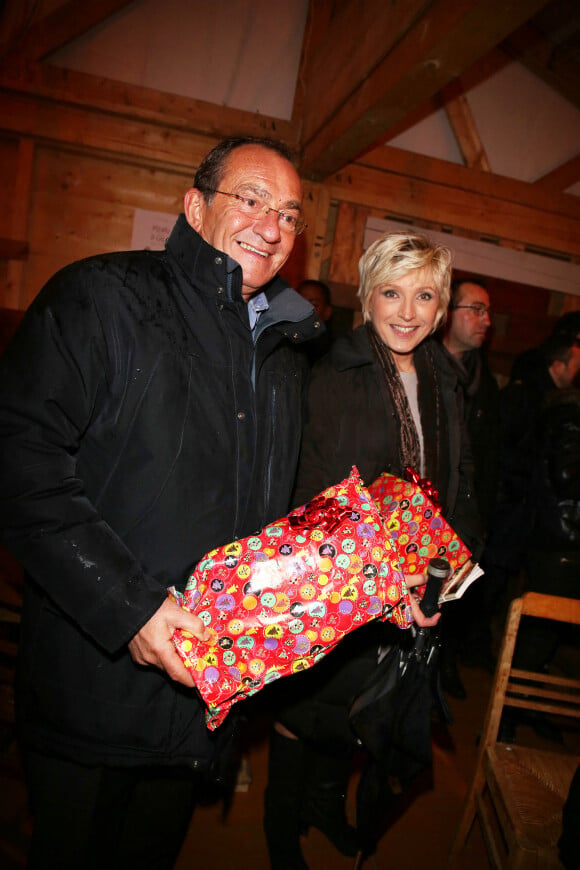 Evelyne Dheliat et Jean-Pierre Pernaut inaugurent le village de noel des Champs Elysees a Paris, le 20 novembre 2013.