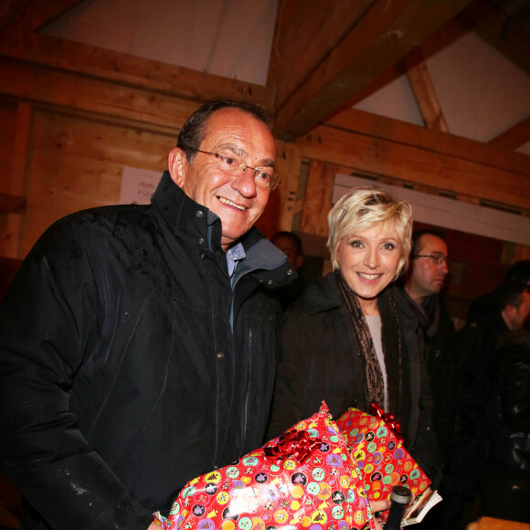 Evelyne Dheliat et Jean-Pierre Pernaut inaugurent le village de noel des Champs Elysees a Paris, le 20 novembre 2013.