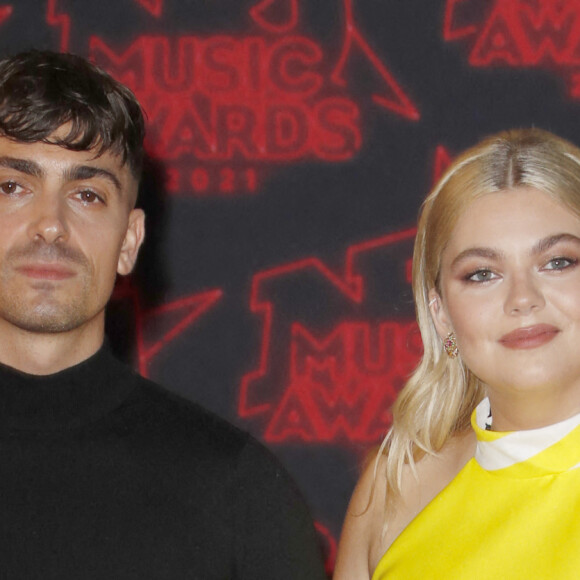 NO WEB - Florian Rossi et sa compagne Louane Emera lors de la 23ème édition des NRJ Music Awards 2021 au Palais des Festivals de Cannes, le 20 novembre 2021. © Christophe Aubert via Bestimage 