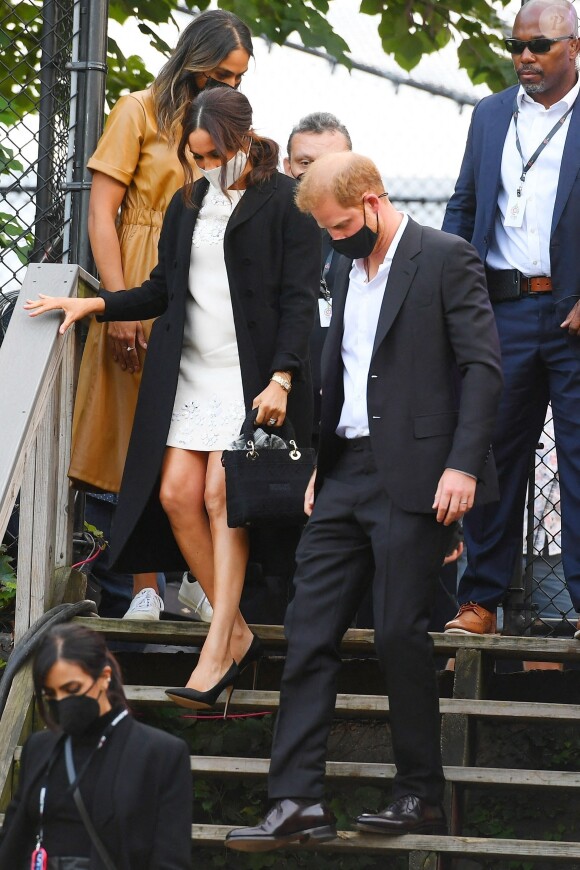 Le prince Harry, duc de Sussex et Meghan Markle quittent le "Global Citizen Live Festival" à Central Park à New York, le 25 septembre 2021.