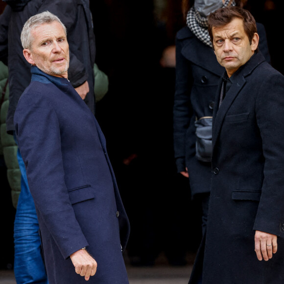Denis Brogniart et Laurent Mariotte - Obsèques de Jean-Pierre Pernaut en la Basilique Sainte-Clotilde à Paris le 9 mars 2022. © Cyril Moreau / Bestimage