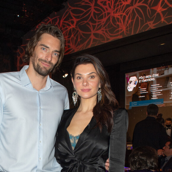 Exclusif - Le nageur Camille Lacourt et sa compagne Alice Detollenaere lors de la soirée de gala de l'Institut Rafaël, maison de l'après Cancer, au Pavillon Gabriel à Paris le 13 décembre 2021. © Erez Lichtfeld / Bestimage 