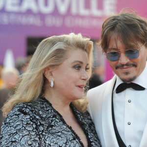 Catherine Deneuve et Johnny Depp à la première du film "Waiting For The Barbarians" lors du 45éme festival du Cinéma Américain de Deauville, France, le 8 septembre 2019.