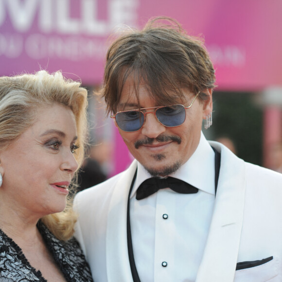 Catherine Deneuve et Johnny Depp à la première du film "Waiting For The Barbarians" lors du 45éme festival du Cinéma Américain de Deauville, France, le 8 septembre 2019.
