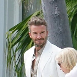 David Beckham discutent avec des invités / Splash News/ABACAPRESS.COM