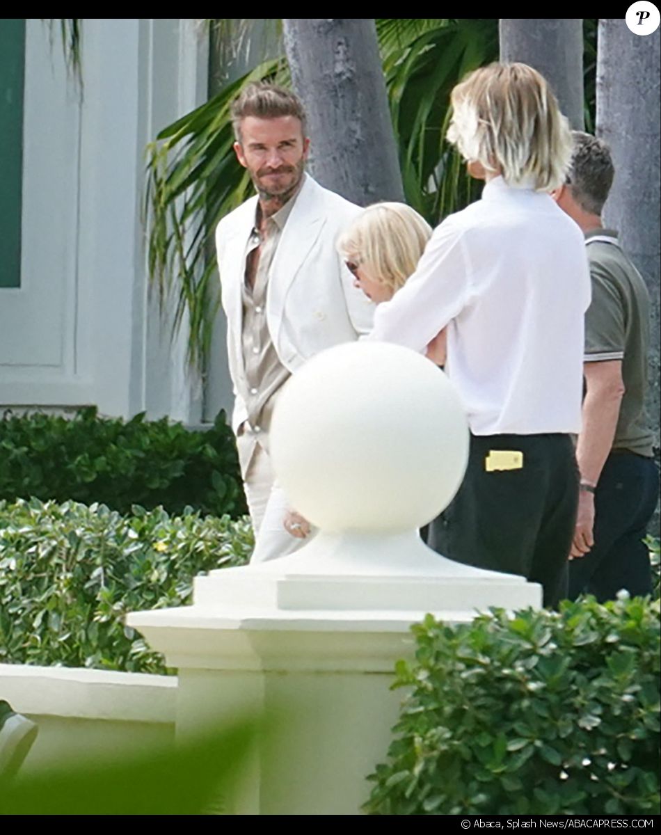 David Beckham discutent avec des invités / Splash News/ABACAPRESS.COM
