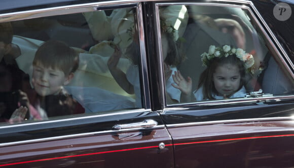 Kate Middleton, duchesse de Cambridge, et la princesse Charlotte de Cambridge arrivent à la chapelle St. George pour le mariage du prince Harry et de Meghan Markle au château de Windsor, Royaume Uni, le 19 mai 2018.