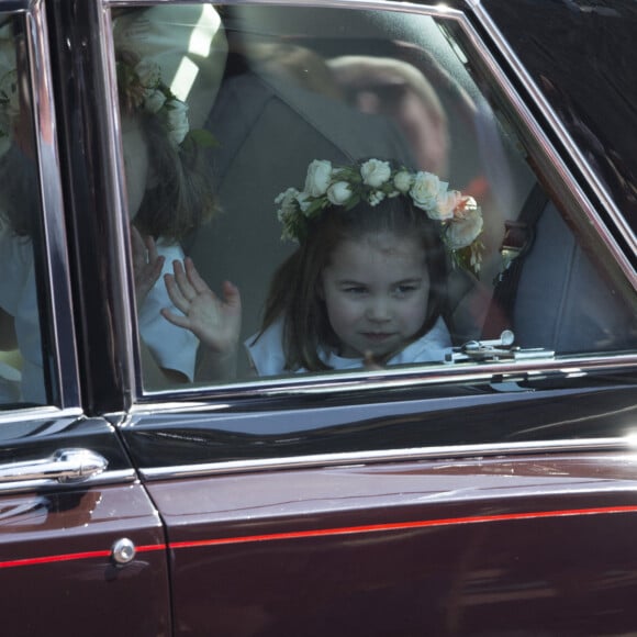 Kate Middleton, duchesse de Cambridge, et la princesse Charlotte de Cambridge arrivent à la chapelle St. George pour le mariage du prince Harry et de Meghan Markle au château de Windsor, Royaume Uni, le 19 mai 2018.