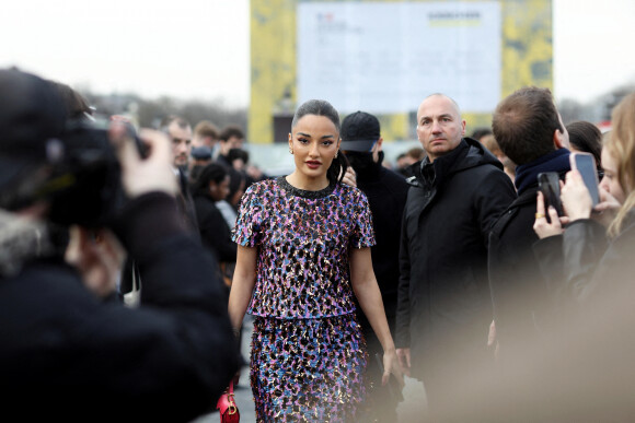 Amina Muaddi - Arrivées au défilé Dior Femme Automne/Hiver 2022/2023 lors de la Fashion Week de Paris, France, le 1er mars 2022. © Dominique Jacovides/Bestimage