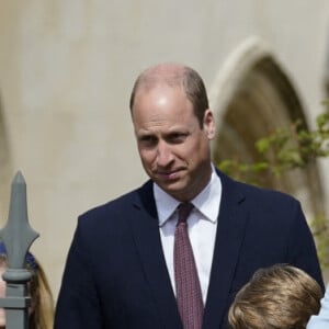 Le prince William, duc de Cambridge, et Catherine (Kate) Middleton, duchesse de Cambridge, Le prince George de Cambridge, La princesse Charlotte de Cambridge - La famille royale britannique quitte la chapelle Saint-Georges de Windsor après la messe de Pâques, le 17 avril 2022. 