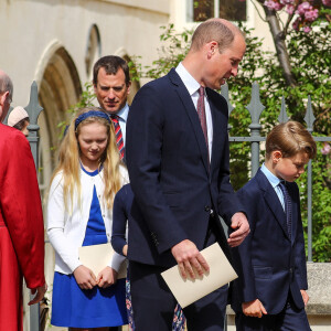Le prince William, duc de Cambridge, et Catherine (Kate) Middleton, duchesse de Cambridge, Le prince George de Cambridge, La princesse Charlotte de Cambridge - La famille royale britannique quitte la chapelle Saint-Georges de Windsor après la messe de Pâques, le 17 avril 2022. 