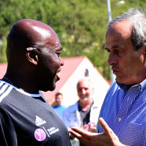 Exclusif - Wilfrid (Wilfried) Mbappé (père de K.Mbappé), Michel Platini (parrain de l'événement) - Match de football caritatif du Variétés Club de France contre l'union départementale des pompiers de l'Ardèche au profit des pilotes de canadairs décédés en mission au Stade Georges Marquand à Aubenas en Ardèche le 18 avril 2022. Les deux équipes se sont quittées sur le score de 2 buts partout devant un public conquis et nombreux, environ 2500 spectateurs ont assisté à cette belle fête du football. 15.000 euros ont été récoltés. © Romain Doucelin/Bestimage