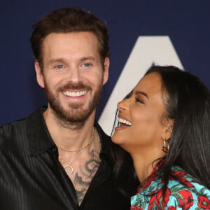 Matt Pokora et sa femme Christina Milian au photocall lors de la première du film "Ambulance" à Los Angeles. 