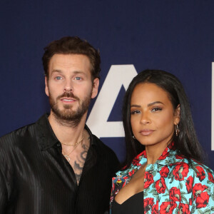 Matt Pokora et sa femme Christina Milian au photocall lors de la première du film "Ambulance" à Los Angeles le 4 avril 2022. 