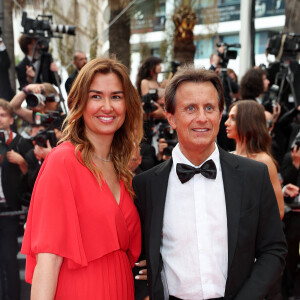 Vincent Perrot et sa femme Virginie - Montée des marches du film " Top Gun : Maverick " lors du 75ème Festival International du Film de Cannes. © Cyril Moreau / Bestimage