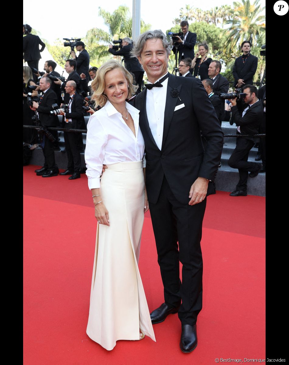 Caroline Roux et Laurent Solly - Montée des marches du film " Triangle of Sadness (Sans filtre) " lors du 75ème Festival International du Film de Cannes. Le 21 mai 2022 © Dominique Jacovides / Bestimage