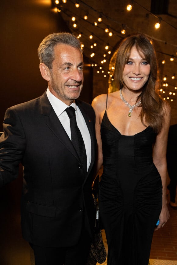 Carla Bruni et son mari Nicolas Sarkozy - Personnalités à la soirée "Women In Motion" par Kering au Château de la Castre lors du 75ème Festival International du Film de Cannes. Le 22 mai 2022. 