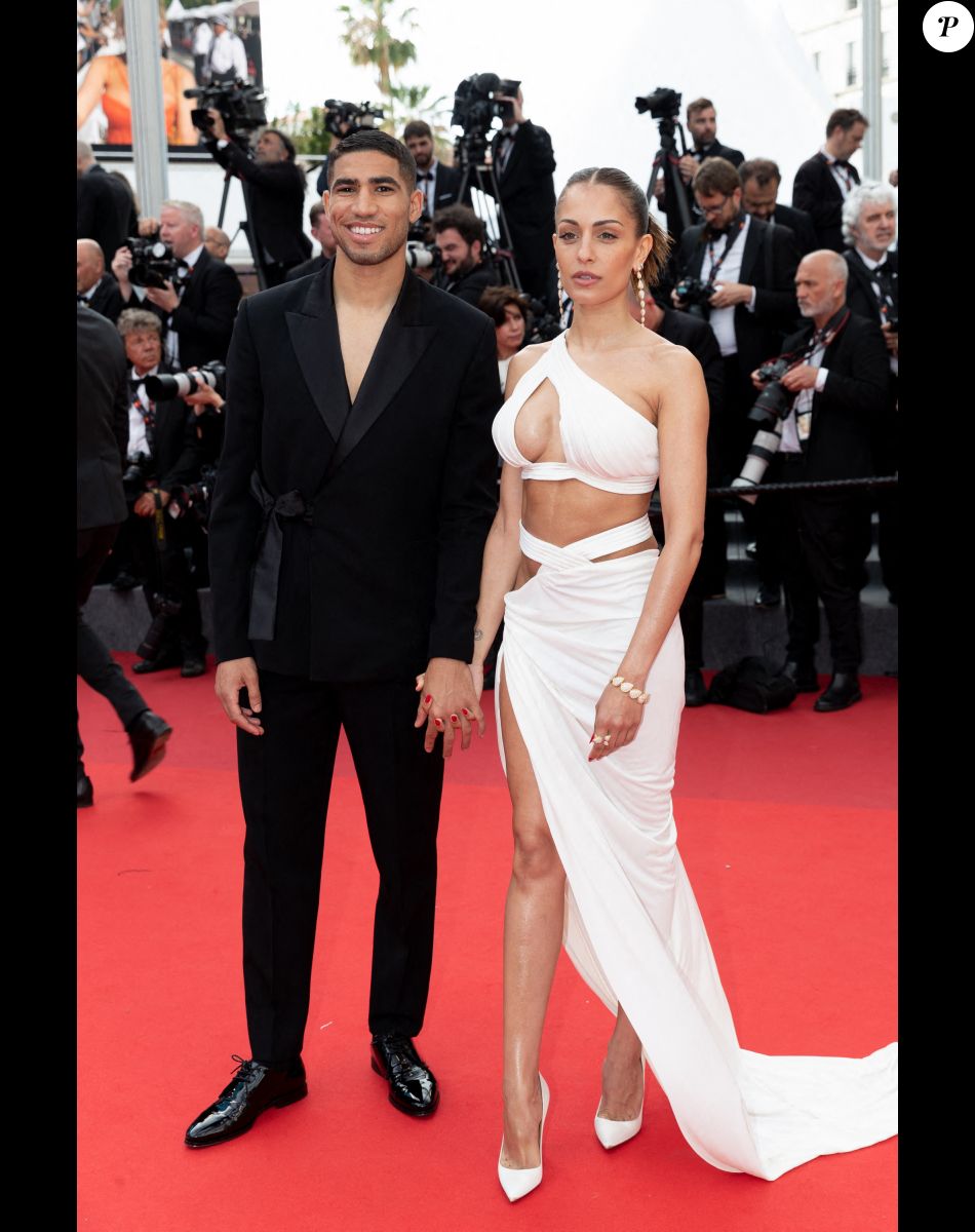 Achraf Hakimi et Hiba Abouk - Montée des marches du film " L'Innocent " lors du 75ème Festival International du Film de Cannes. Le 24 mai 2022 © Cyril Moreau / Bestimage