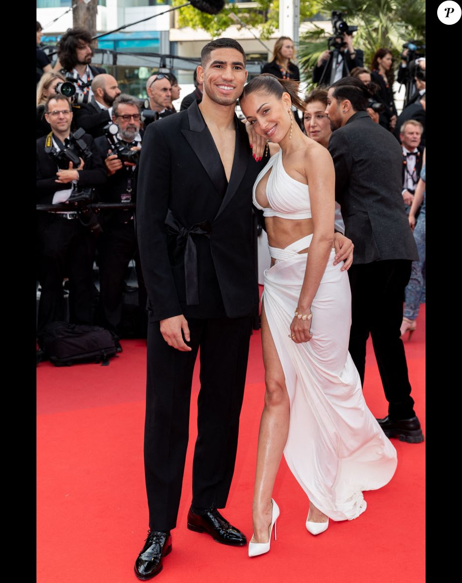 Achraf Hakimi et Hiba Abouk - Montée des marches du film " L'Innocent " lors du 75ème Festival International du Film de Cannes. Le 24 mai 2022 © Cyril Moreau / Bestimage