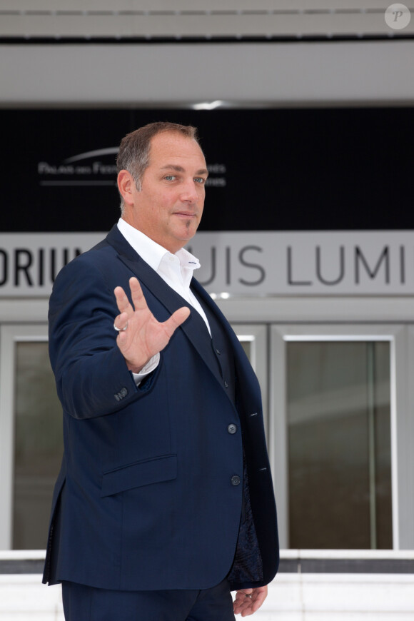 Messmer pose à l'occasion du MIPCOM à Cannes, le 13 octobre 2014.