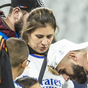 Karim Benzema et son fils Ibrahim - Les joueurs du Real Madrid célèbrent en famille la victoire de leur équipe face à Liverpool (1-0) en finale de la Ligue des champions au stade de France, le 28 mai 2022. Saint-Denis. © Cyril Moreau / Bestimage