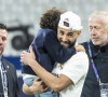 Karim Benzema et son fils Ibrahim - Les joueurs du Real Madrid célèbrent en famille la victoire de leur équipe face à Liverpool (1-0) en finale de la Ligue des champions au stade de France. Saint-Denis. © Cyril Moreau / Bestimage