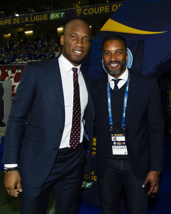 Didier Drogba et Habib Beye - Le Racing Club de Strasbourg remporte la finale de la coupe de la ligue de football contre l'EA Guingamp après une séance de tirs au but à Lille le 30 mars 2019. © Pierre Perusseau/Bestimage 