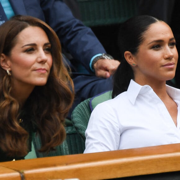 Archives - Catherine (Kate) Middleton, duchesse de Cambridge, Meghan Markle, duchesse de Sussex, sont dans les tribunes lors de la finale femme de Wimbledon "Serena Williams - Simona Halep (2/6 - 2/6) à Londres © Chryslène Caillaud / Panoramic / Bestimage