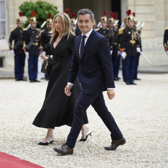 Le ministre de l'Intérieur, Gérald Darmanin et son épouse Rose-Marie Devillers arrivent pour un dîner d'Etat avec le président français Emmanuel Macron et son homologue italien, Sergio Mattarella, au palais de l'Elysée, Paris, le 5 juillet 2021