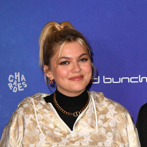 Louane et son compagnon Florian Rossi - Avant Première de " Belle " film animé japonais au Grand Rex à Paris le 6 décembre 2021 . © Veeren / Bestimage 