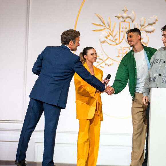 Laure Valee, Kamel Kebir, aka Kameto, Amine Mekri, aka Prime - Le président de la République française, Emmanuel Macron reçoit les acteurs de l'esport français à l'occasion de la TrackMania Cup au palais de l'Elysée à Paris, France, le 3 juin 2022