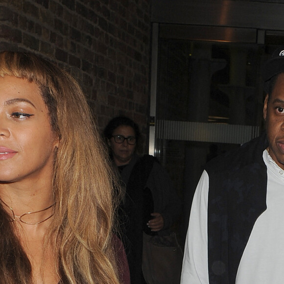 Beyonce Knowles et Jay-Z et leur fille Blue Ivy arrivent à Londres par l'Eurostar le 14 octobre 2014. 
