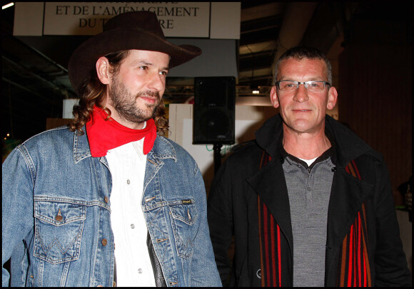 Fabien et Jean-Claude au vernissage de l'exposition "L'Amour est dans le pré" à Paris le 29 févroer 2012.