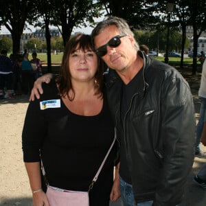 Michèle Bernier et son ex-compagnon Bruno Gaccio - 2ème tournoi de pétanque au profit de l'association "MeghanOra" sur l'Esplanade des Invalides à Paris, le 28 septembre 2014.