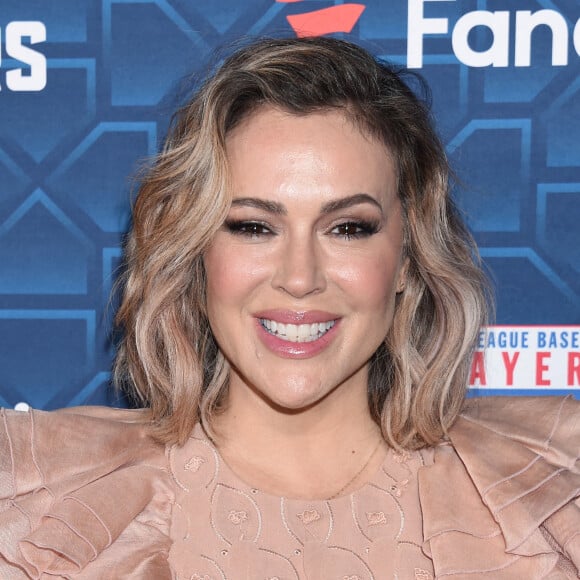 Alyssa Milano au photocall de la soirée "The Players Party" à Los Angeles, le 18 juillet 2022. 