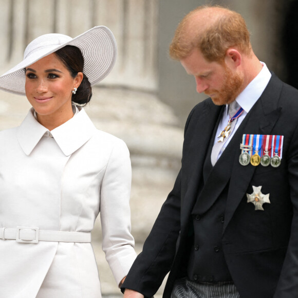 Le prince Harry, duc de Sussex, et Meghan Markle, duchesse de Sussex - Les membres de la famille royale et les invités lors de la messe célébrée à la cathédrale Saint-Paul de Londres, dans le cadre du jubilé de platine (70 ans de règne) de la reine Elisabeth II d'Angleterre. Londres, le 3 juin 2022.