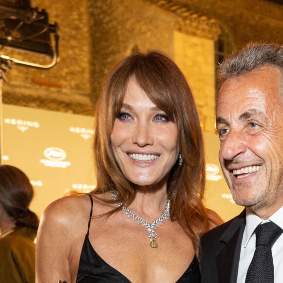 Carla Bruni et son mari Nicolas Sarkozy - Personnalités à la soirée "Women In Motion" par Kering au Château de la Castre lors du 75ème Festival International du Film de Cannes. Le 22 mai 2022 © Olivier Borde / Bestimage 