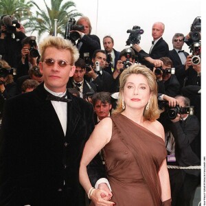 Guillaume Depardieu et Catherine Deneuve - Montée des marches du film "Pola X" au Festival de Cannes en 1999.