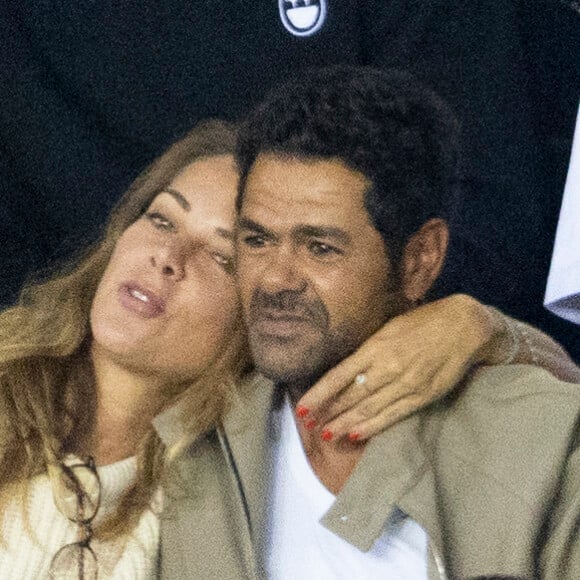 Jamel Debbouze et Mélissa Theuriau assistent au match aller de la Ligue des Champions entre le Paris Saint-Germain contre la Juventus (2-1) au Parc des Princes à Paris le 6 septembre 2022.