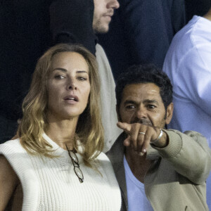 Jamel Debbouze et Mélissa Theuriau assistent au match aller de la Ligue des Champions entre le Paris Saint-Germain contre la Juventus (2-1) au Parc des Princes à Paris le 6 septembre 2022.