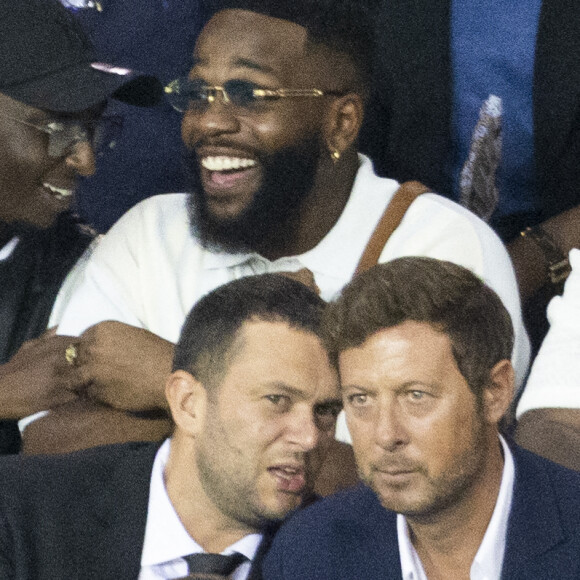 Tayc et Ahmed Sylla - People assistent au match aller de la Ligue des Champions entre le Paris Saint-Germain contre la Juventus (2-1) au Parc des Princes à Paris le 6 septembre 2022.