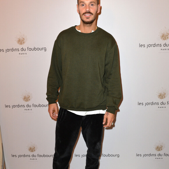 Exclusif - Matt Pokora (M. Pokora) - Inauguration du nouvel hôtel 5 parisien au coeur du Triangle d'Or "Les Jardins du Faubourg" à Paris le 10 septembre 2019. Situé à deux pas d'adresses prestigieuses telles que les Champs-Élysées, la place de la Concorde, le Faubourg Saint-Honoré et le Palais de l'Élysée, l'hôtel Les Jardins du Faubourg s'annonce comme le nouvel écrin incontournable du Triangle d'Or. A propos des Jardins du Faubourg : Avec 32 chambres et 4 suites, l'hôtel donne sur une cour intérieure végétalisée et possède une magnifique terrasse de plus de 100 m2. Le tout nouveau restaurant des Jardins du Faubourg, " La Régalade du Faubourg ", est confié au chef Bruno Doucet, initiateur de la bistronomie. Mêlant produits frais, de saison, de grande qualité avec une cuisine généreuse et contemporaine, cette nouvelle adresse inédite et pleine d'audace, fera le bonheur de tous les clients. Le bar, " The Confidentiel ", écrin chaleureux, élégant et intimiste, aux lumières tamisées le soir venu, propose une collection de cocktails originale et savoureuse. Les Jardins du Faubourg propose également un Spa d'exception de plus de 400 m2 avec une carte de soins unique signée Olivier Lecoq, une piscine intérieure aux dimensions exceptionnelles avec hammam et sauna, ainsi qu'une salle de fitness avec du matériel dernière génération, du coaching personnalisé et des cours de yoga. La gamme de produits de soins luxueuse et respectueuse de l'environnement Olivier Lecocq Paris est en vente dans le spa de l'hôtel. © Veeren/Bestimage 