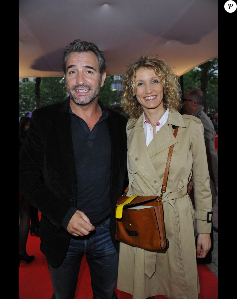 Jean Dujardin et Alexandra Lamy à l'avant-première du film "Un bonheur n'arrive jamais seul" au Gaumont Marignan à Paris, le 15 juin 2012.