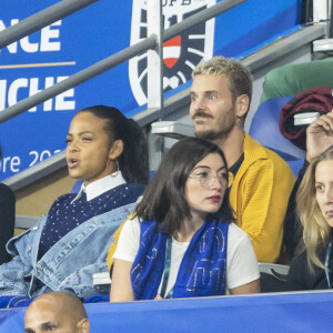 M. Pokora (Matt Pokora), sa femme Christina Milian assistent au match de la 5ème et avant-dernière journée de Ligue des nations entre la France et l'Autriche (2-0) au Stade de France à Saint-Denis le 22 septembre 2022. 