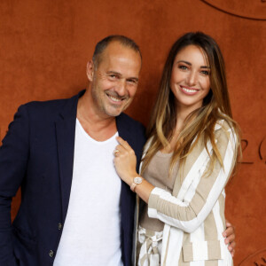 Roger Erhart et Delphine Wespiser, Miss France 2012 au village (jour 10) lors des Internationaux de France de Tennis de Roland Garros 2022 à Paris, France, le 31 mai 2022