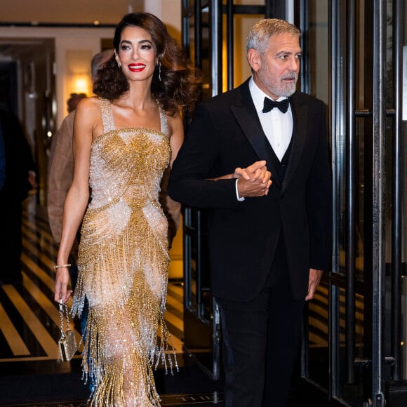 George Clooney et sa femme Amal Clooney à la sortie de leur hôtel à New York, le 29 septembre 2022. 