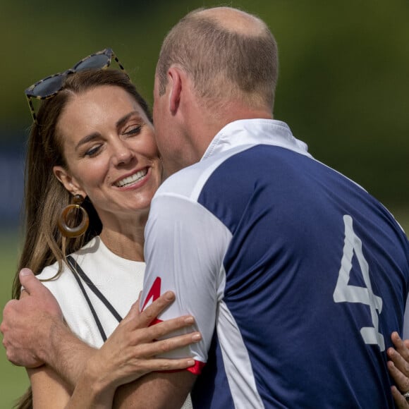 Le prince William, duc de Cambridge, et Catherine (Kate) Middleton, duchesse de Cambridge, arrivent au match de polo caritatif Out-Sourcing Inc au Guards Polo Club, Smiths Lawn à Windsor le 6 juillet 2022. 