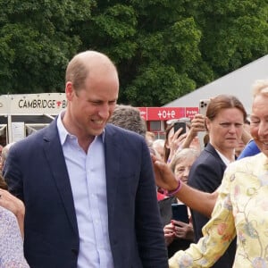 Le prince William, duc de Cambridge, et Catherine (Kate) Middleton, duchesse de Cambridge, lors d'une visite à la toute première journée du comté de Cambridgeshire à l'hippodrome July à Newmarket, Royaume Uni, le 23 juin 2022. 