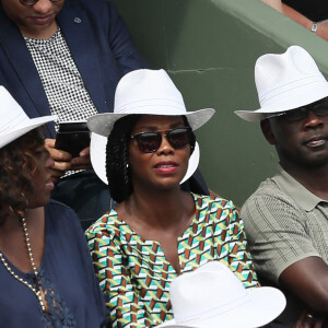 Lilian Thuram et sa compagne Kareen Guiock - Jour 1 - dans les tribunes des Internationaux de Tennis de Roland-Garros à Paris, le 27 mai 2018. © Jacovides/Moreau/Bestimage